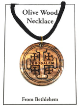 画像をギャラリービューアに読み込む, Handmade in Bethlehem olive wood Jerusalem cross circular pendant with black cord in packaging