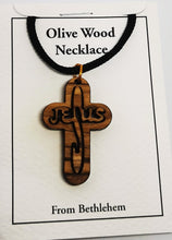 画像をギャラリービューアに読み込む, Handmade in Bethlehem olive wood Jesus cross pendant with black cord in packaging