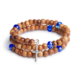 Handmade Wrap Around Olive Wood Bracelet With Dark Blue Bead Detail With Silver Jerusalem Cross