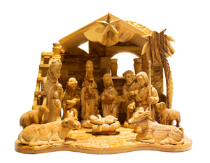 Large nativity scene. Holy family. Stable, star of Bethlehem. 3 kings,  Mary Jesus, Joseph, Shepherd, lambs, donkey, cow