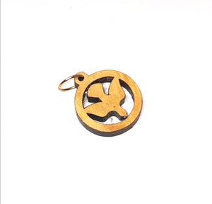 Handmade in Bethlehem olive wood dove in circular pendant 