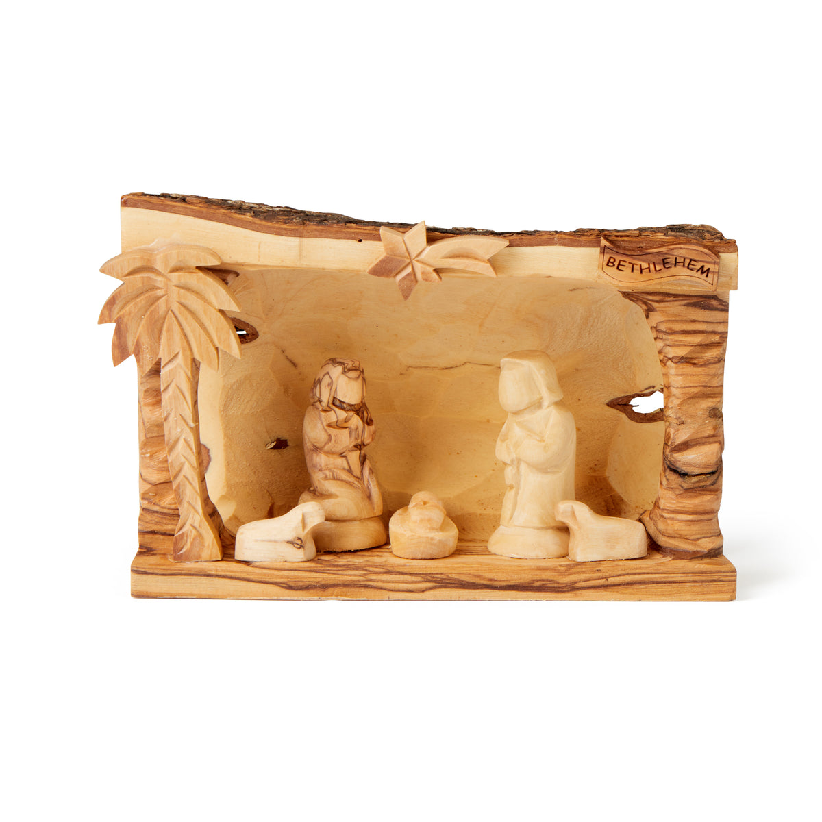 Large Log Nativity with Faceless Figures – From The Olive Tree
