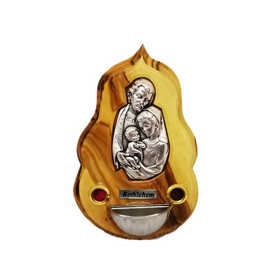 Olive wood magnet, with rose petals and incense, picture  embossed in metal of Mary, Joseph and baby Jesus adult Jesus. Small plaque says Bethlehem. 