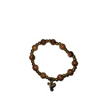 Load image into Gallery viewer, Hand Crafted Olive Wood Bead Bracelet with Golden Beads &amp; Silver Dove Cross
