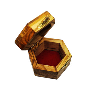 Inside of olive wood trinket box hand made in Bethlehem , lined with red velvet